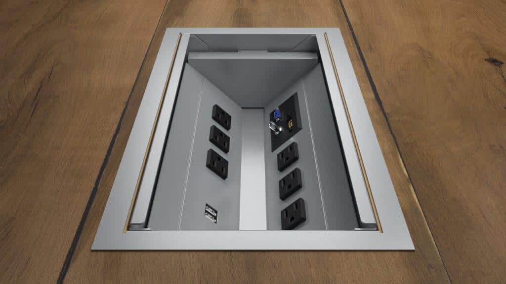 Angled view of gray Volt power add-on option, inlaid into table